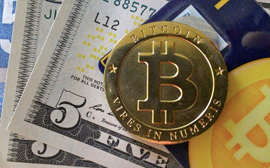 比特币突破47000万美元 一枚比特币可换一斤半黄金