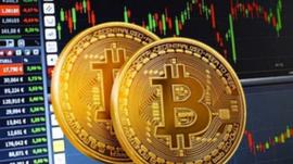 买比特币:开启加密货币下个时代？特斯拉的举动意味着什么_加密货币
